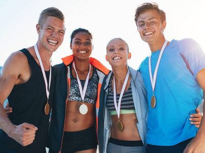 Finishers Wearing Race Medals Finishers Wearing Race Medals