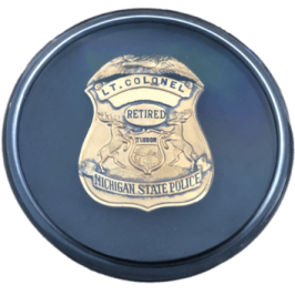 State Police Badge in Display Case